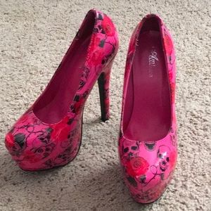 Super high heels skulls and roses. Size 6.